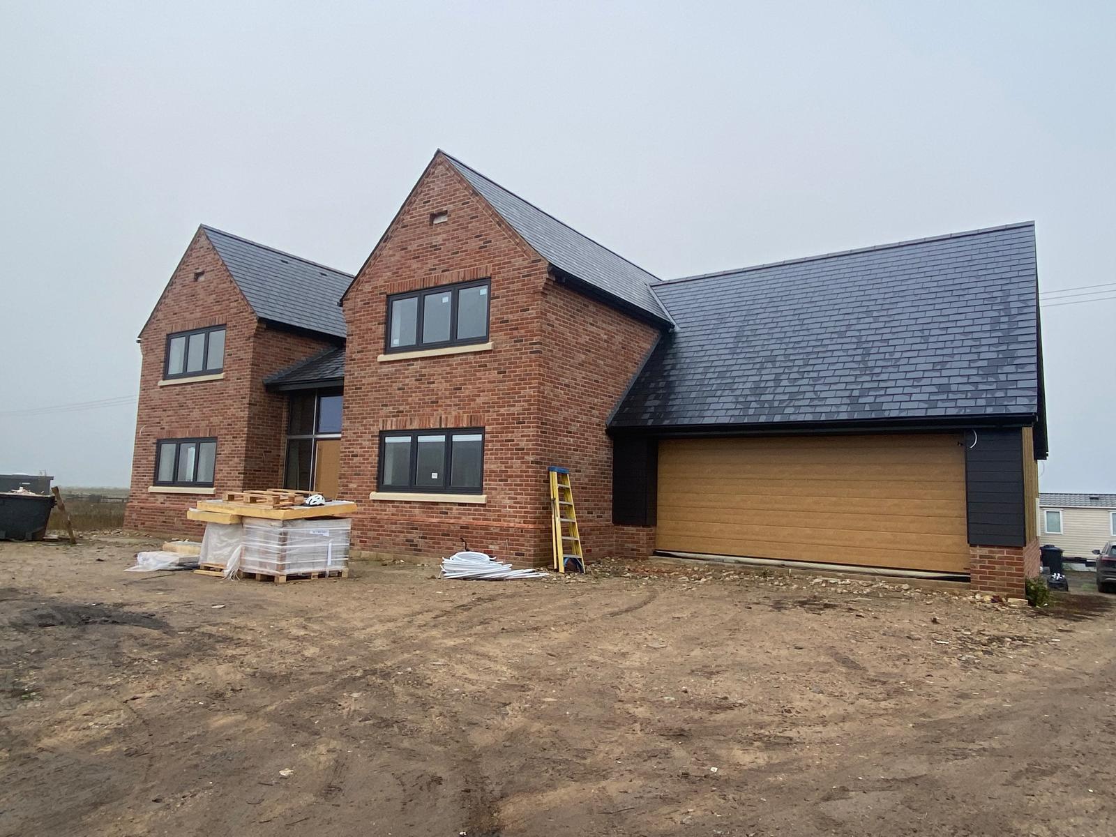 Steve's own self-build — a brick detached home nearing completion